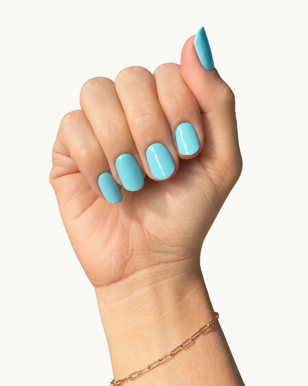 Poolside gel nails shown on a hand