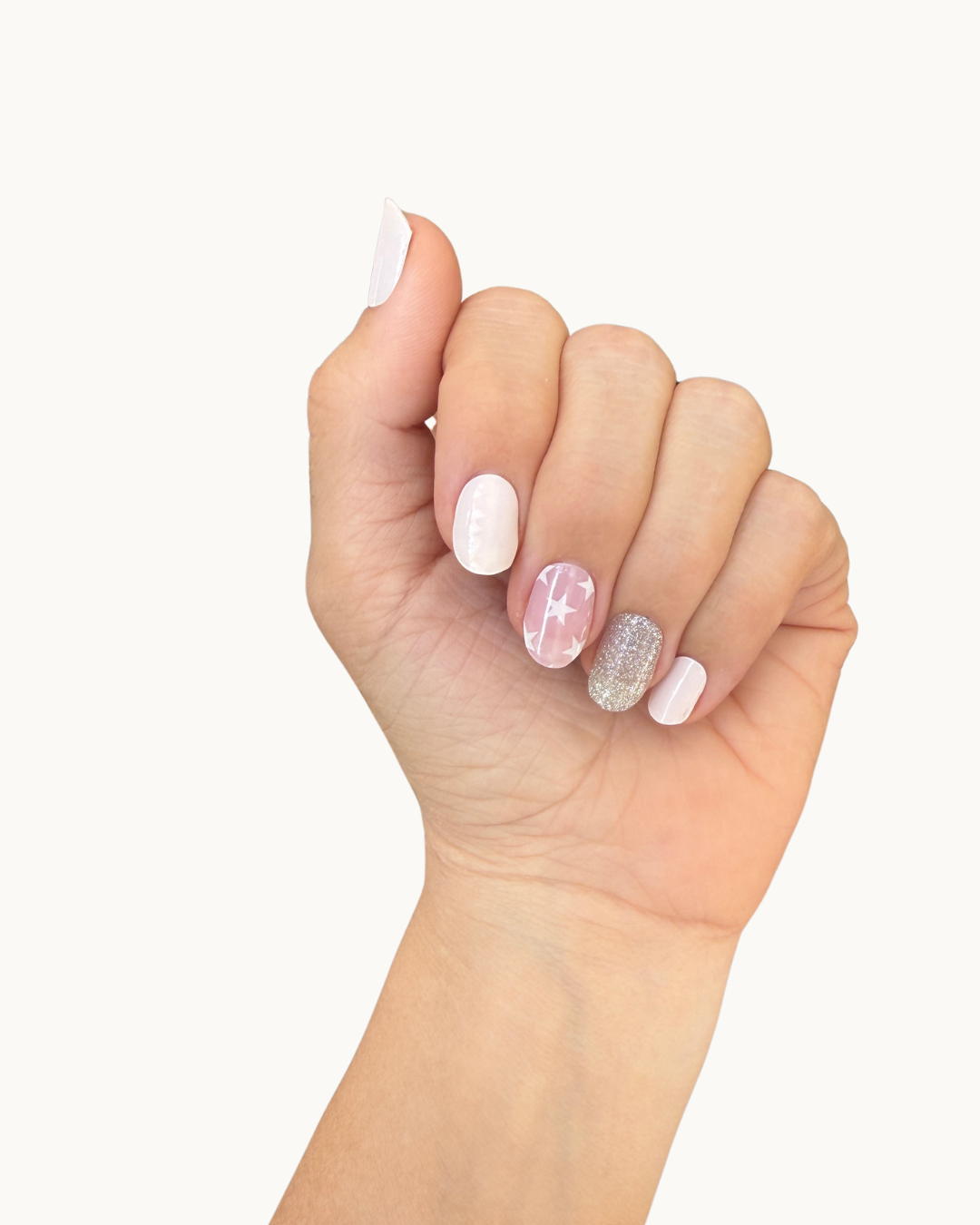 Star Girl gel nails shown on a hand