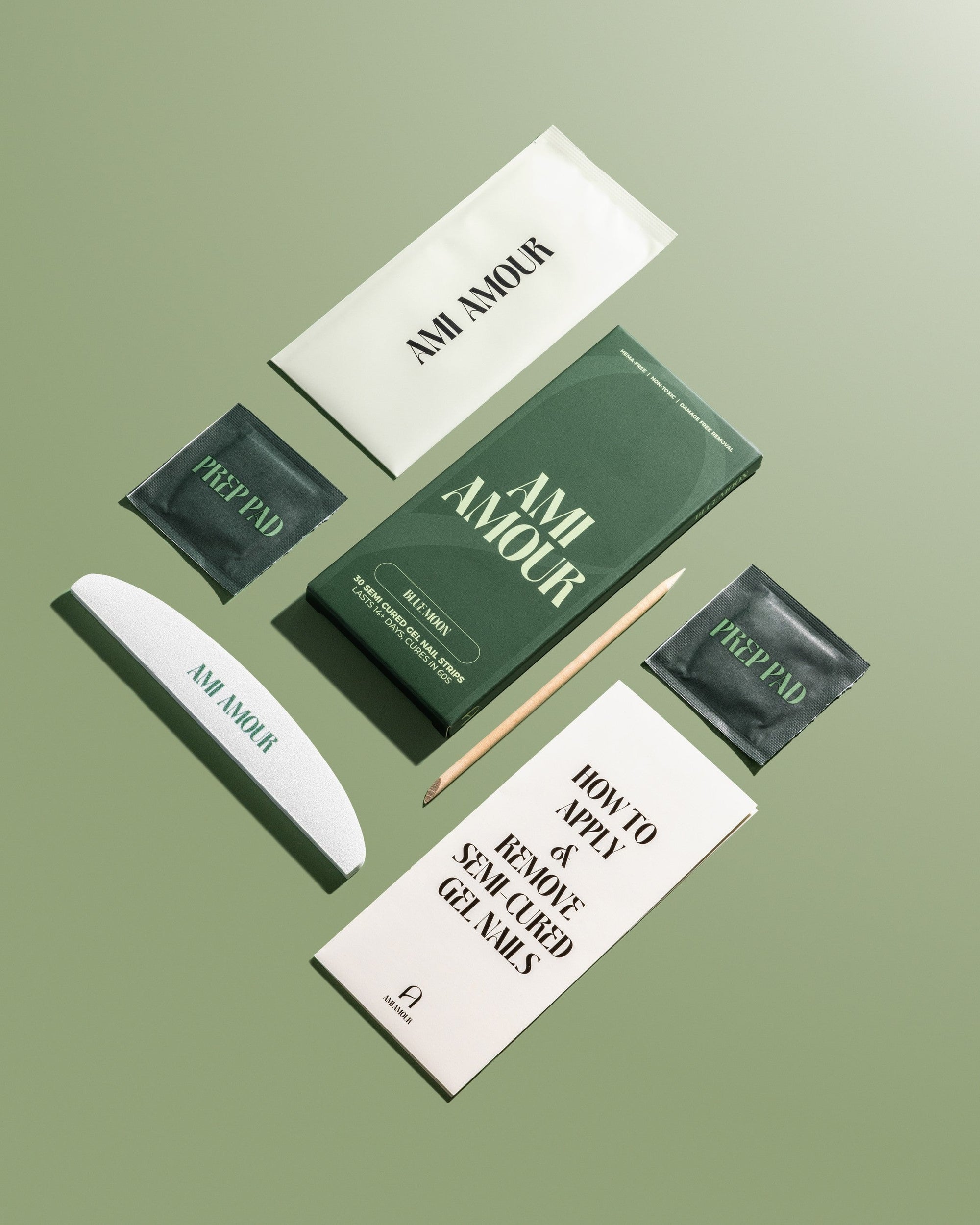 Ami Amour semi-cured gel nail strips - kit contents including box, prep pads, nail file, cuticle stick and how-to guide